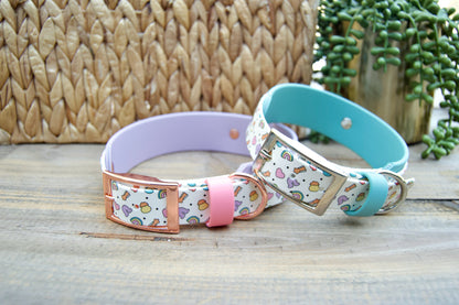 Two dog collars with Lucky Charm Pattern on a wooden surface.