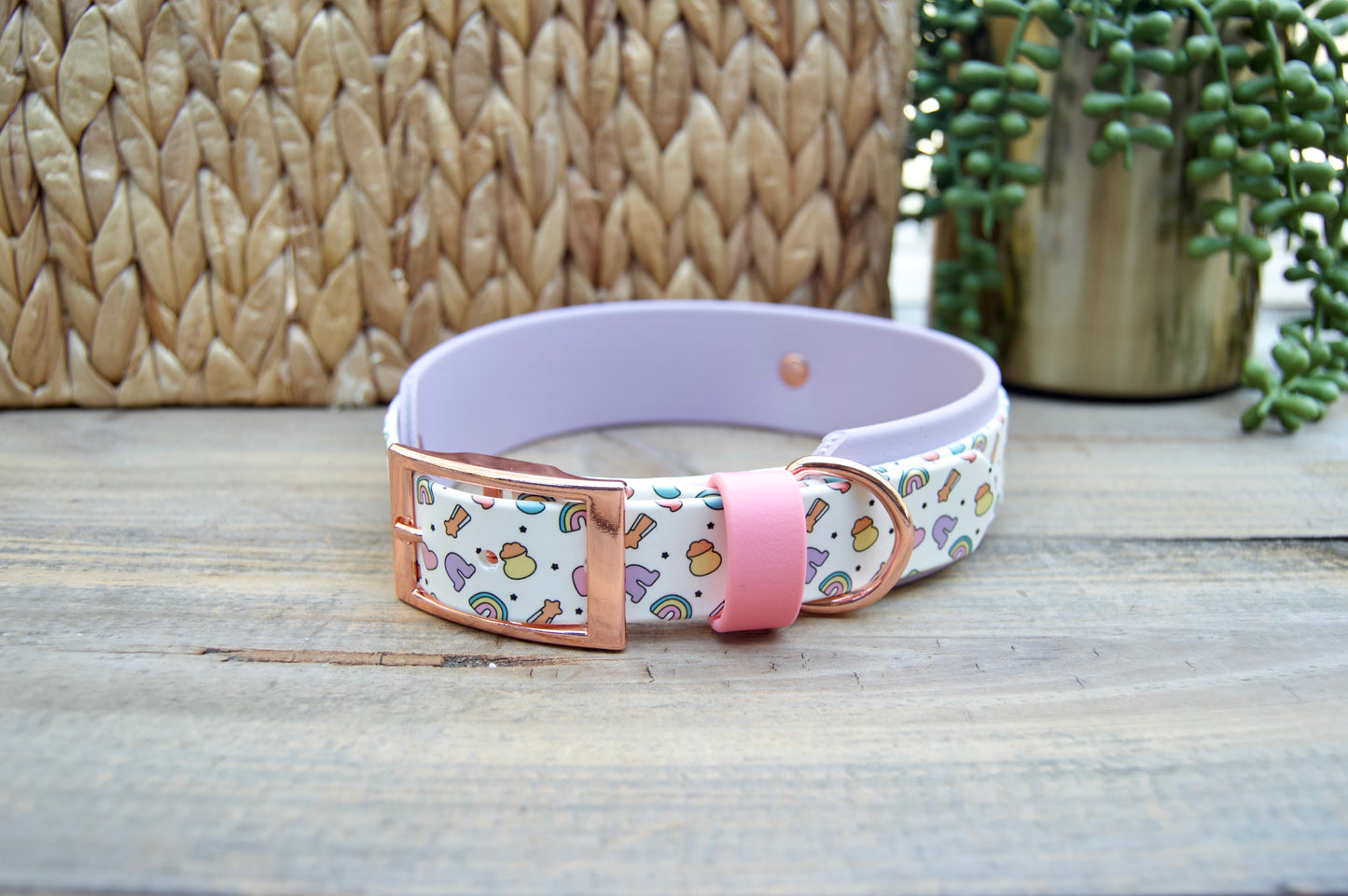 Dog collar with Lucky Charm pattern and Lilac accents on a wooden surface