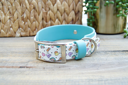 Dog collar with Lucky Charm pattern with Dusty Turquoise Accents on a wooden surface