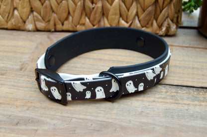 Dog collar with ghost pattern on a wooden surface