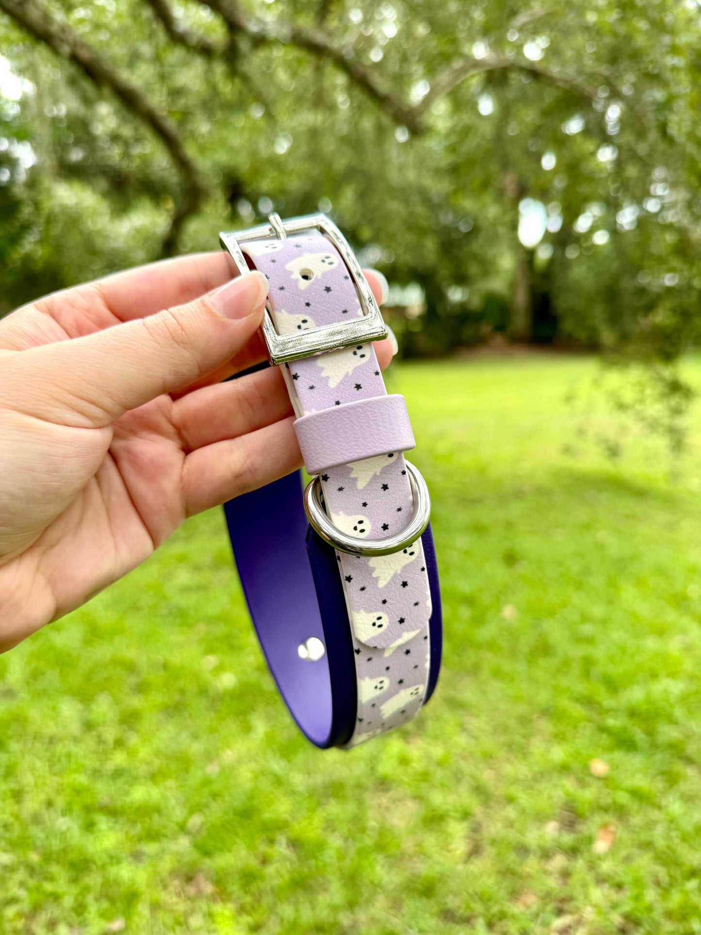 Dog collar with purple band with white ghosts and tiny black stars pattern